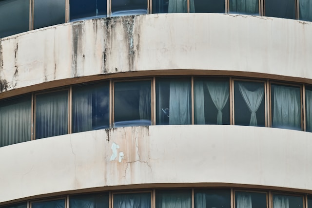Property manager mold mistakes – early signs of water damage on apartment ceiling